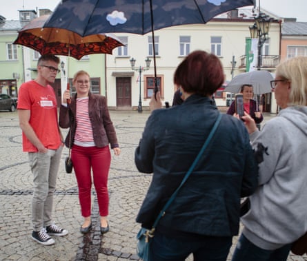 Tuleya poses for a photo with a supporter in Chełm.