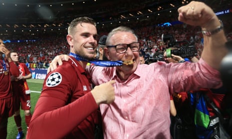 Jordan Henderson hugs his father Brian after Liverpool’s Champions League triumph.