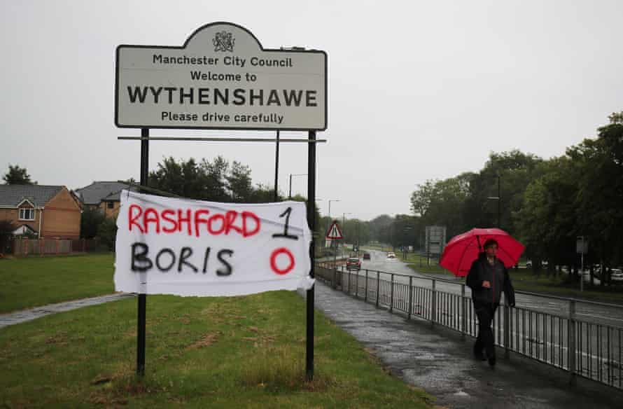 A banner in Wythenshawe after Boris Johnson agreed to extend free school meals during the summer holidays in England.