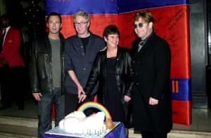 Julian Clary, Paul O’Grady, Angela Mason and Elton John cutting the cake for Stonewall’s 10th birthday celebration the Royal Albert Hall in London in 1999