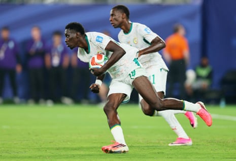 Ismaila Sarr runs carrying the ball