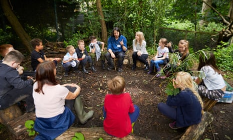 Pupils enjoying forest school within the grounds of St Mary’s Church of England Primary School in South Reddish, Stockport, June 2019