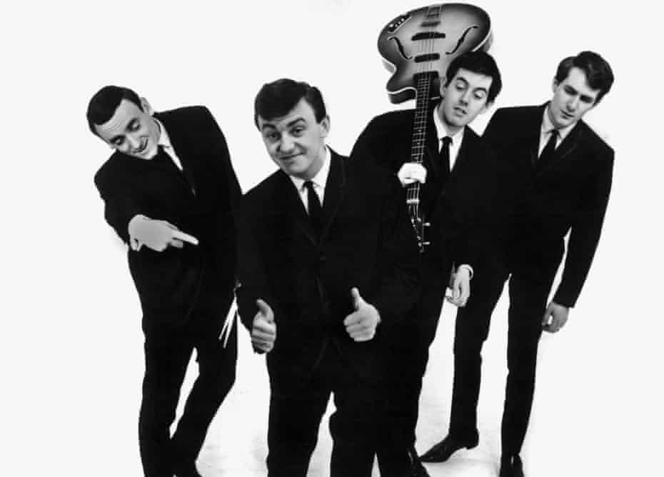 Gerry Marsden, second from left, with Gerry and the Pacemakers, from left, Freddie Marsden, Les Chadwick and Les Maguire. The band reached No 1 with their first three singles.