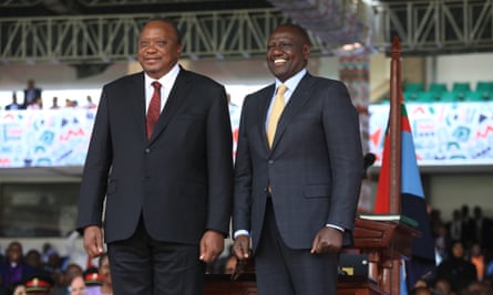 President William Ruto and Uhuru Kenyatta pose for the camera side by side