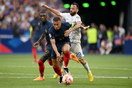 Manolis Siopis, pictured here trying to get to grips with Kylian Mbappe, has signed for Cardiff City on a free transfer.