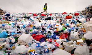 A large pile of plastic bottles