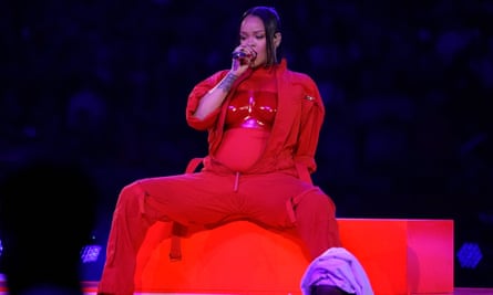 Rihanna performing during the halftime show of Super Bowl LVII wearing Jonathan Anderson’s boiler suit on 12 February 2023.