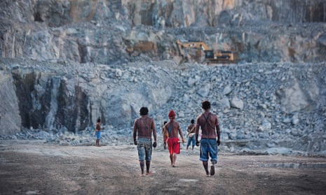 Indigenous men survey the quarry site for the Belo Monte dam, Brazil’s largest engineering project.