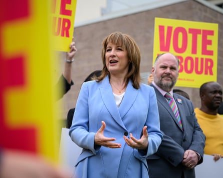 Rachel Reeves surrounded by Vote Labour placards