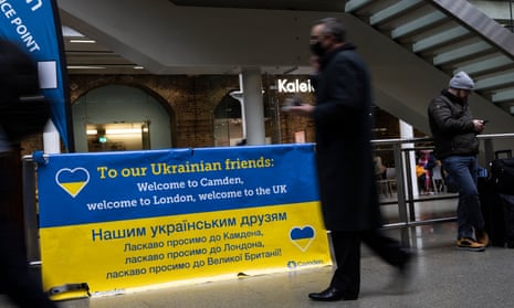 A sign welcoming Ukrainian refugees at St Pancras station in London