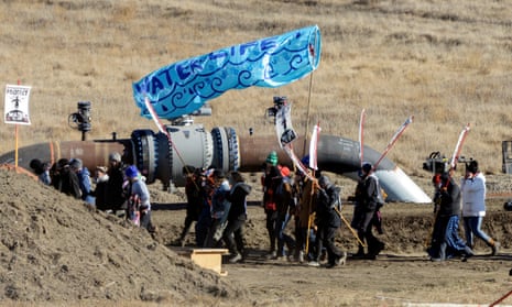 Protesters march along the pipeline route during a protest against the Dakota Access pipeline near the Standing Rock Indian Reservation in November 2016.