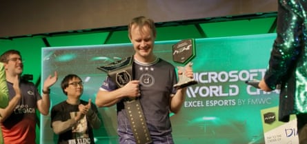 Diarmuid Early with his trophy and wrestling belt.