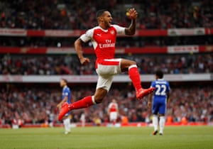 Arsenal’s Theo Walcott celebrates scoring their second goal, his first in consecutive Premier League games for the first time since May 2013. “It was an outstanding team performance,” said Arsène Wenger. “We played with spirit and collective pace and movement, always in a positive and committed team way”