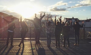 Employees stretching on the terrace.