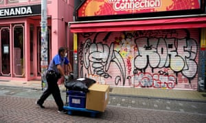 Coronavirus live news: record daily cases in South Africa as India extends lockdown 7 A delivery man wearing a face mask walks before a closed store at Harajuku district in Tokyo, Japan, 15 May 2020.