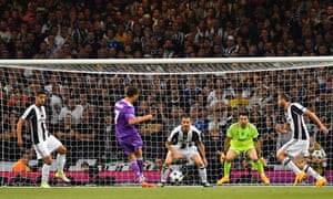 Real Madrid’s Cristiano Ronaldo, second left, shoots to score the opening goal.
