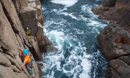 Rock climbing up a sea stack near Gweedore.