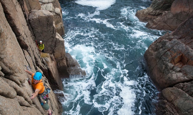 Rock climbing up a sea stack near Gweedore.