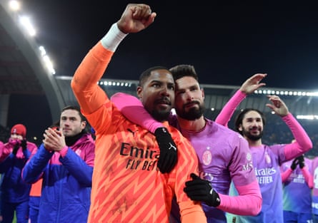 Mike Maignan gestures to fans after the match – Milan’s goalkeeper re-entered the pitch to help his side secure a 3-2 comeback win.