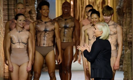 Maria Grazia Chiuri with dancers at the end of the show in Paris.