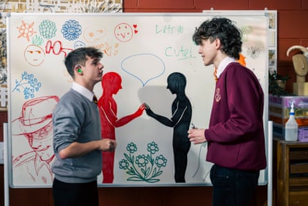 Two boys in front of a whiteboard in Waterloo Road