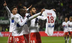 Nabil Fekir shows off his shirt after scoring in Lyon’s 5-0 win at St-Etienne.