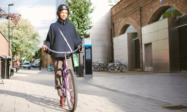 Woman commuting by bicycle.
