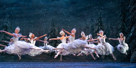 the royal ballet corps all in white and in midair