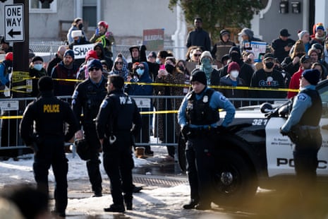 People confront Minneapolis Police officers holding a perimeter after a shooting by an ICE agent during federal law enforcement operations on January 07, 2026 in Minneapolis, Minnesota. According to federal officials, the agent,