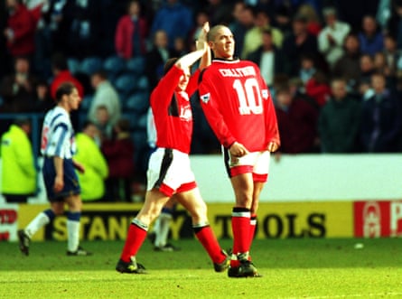 Stan Collymore celebrates after scoring for Forest.