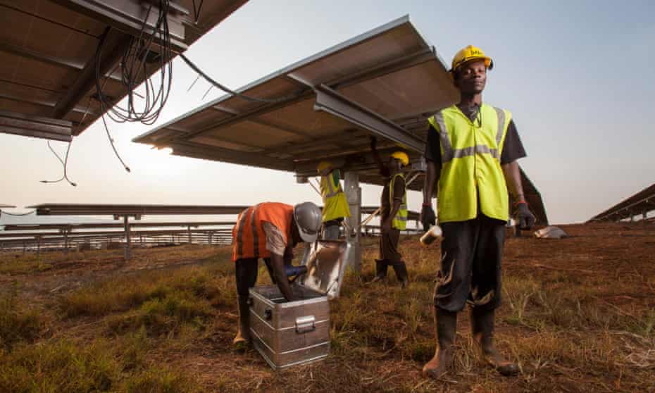 Technicians installing panels in one of East Africa’s largest solar farms, Rwamagana District, Rwanda.