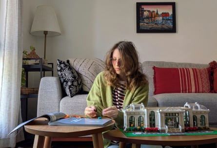 Bec putting together a Lego set.