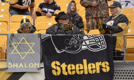 Pittsburgh Steelers fans at an NFL football game on Sunday, the day after the attack.
