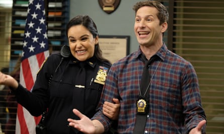 Melissa Fumero as Amy Santiago and Samberg as Jake Peralta.