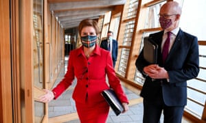 Scottish first minister Nicola Sturgeon and deputy John Swinney pictured yesterday at the Scottish parliament building in Edinburgh to deliver a Covid-19 policy update.