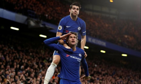 Marcos Alonso salutes the crowd after scoring Chelsea’s second goal as Álvaro Morata joins in the celebration.