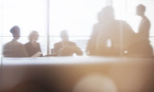 Silhouette of business people in meeting