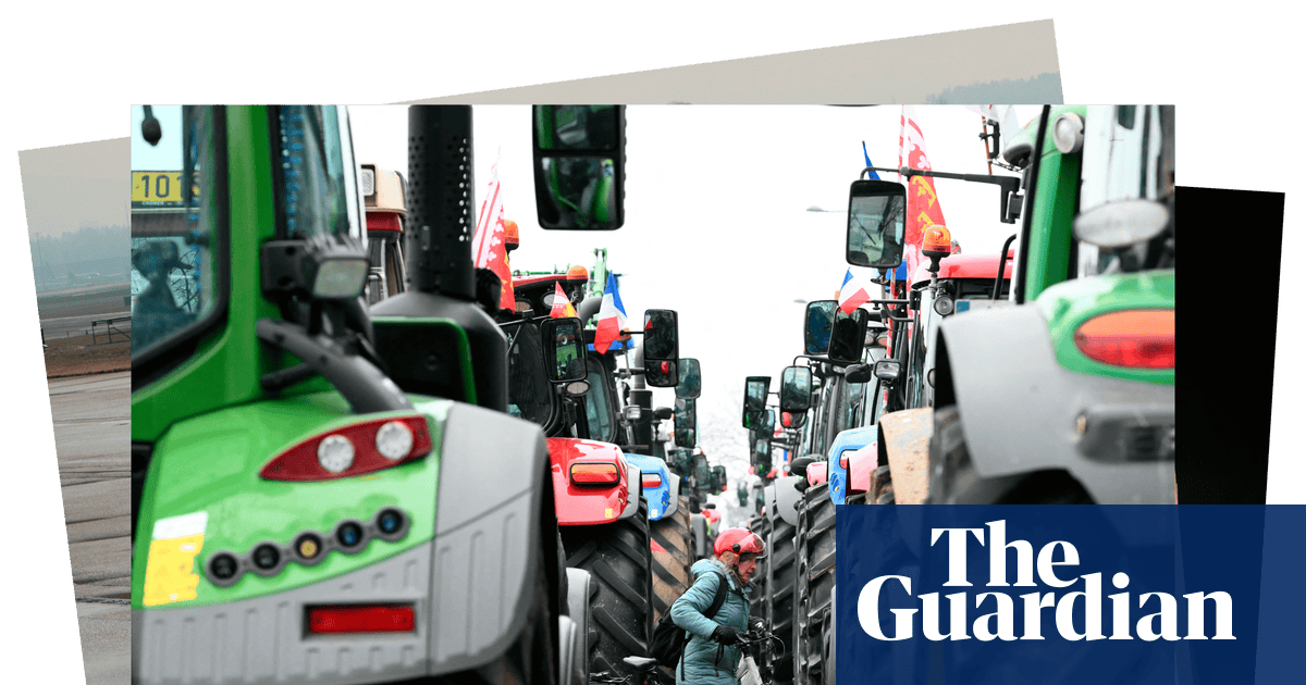 Trump, tractors and camels on parade: photos of the day – Wednesday