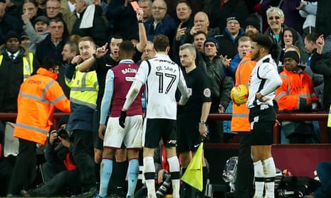 Leandro Bacuna is shown a red card by referee Andrew Madley during Aston Villa’s recent 1-0 victory over Derby County. 