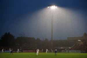 The rain hammers down during the FA Cup third- round match between Boreham Wood and AFC Wimbledon