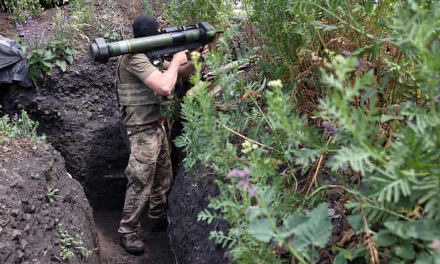 A Ukrainian serviceman mans a presumption   successful  a trench connected  the beforehand   enactment     adjacent   Avdiivka, Donetsk portion   connected  18 June.