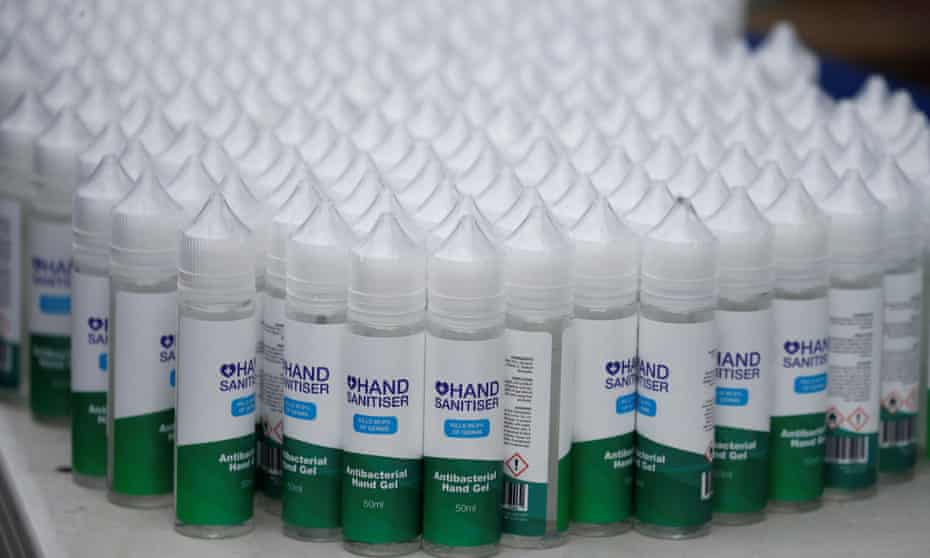 Bottles of hand sanitiser on sale at a market stall in Liverpool.