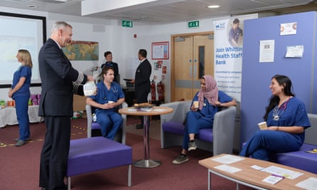 David Fielding with NHS staff at Whittington hospital