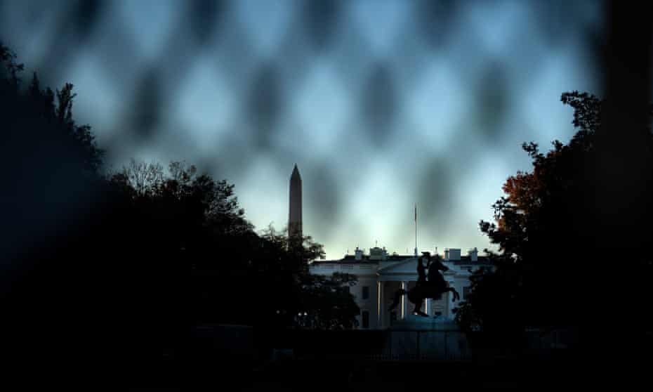 US-VOTE-WHITE HOUSE<br>A view of the White House is seen through a temporary security fence as the 2020 US presidential election remains undecided on November 4, 2020, in Washington, DC. - President Donald Trump and Democratic challenger Joe Biden are battling it out for the White House, with polls closed across the United States -- and the American people waiting for results in key battlegrounds still up for grabs. (Photo by Brendan Smialowski / AFP) (Photo by BRENDAN SMIALOWSKI/AFP via Getty Images)