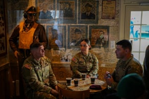 Members US soldiers drink coffee in a bar