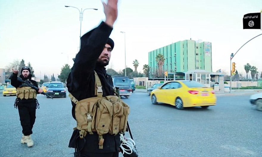 Isis released a propaganda video showing two deaf-mute brothers directing traffic in Mosul