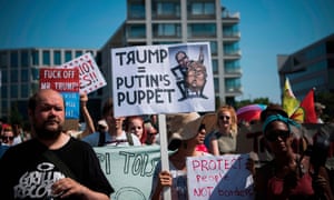 FINLAND-RUSSIA-US-POLITICS-DIPLOMACY-SUMMIT-DEMOProtesters take part in the so-called “Helsinki against Trump and Putin” demonstration on the sidelines of the meeting between US President Donald Trump and Russian counterpart Vladimir Putin on July 16, 2018, in Helsinki, Finland. / AFP PHOTO / Jonathan NACKSTRANDJONATHAN NACKSTRAND/AFP/Getty Images