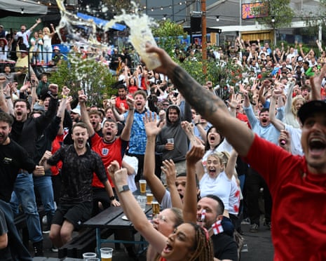 Fans watch England V DR Congo in Manchester.