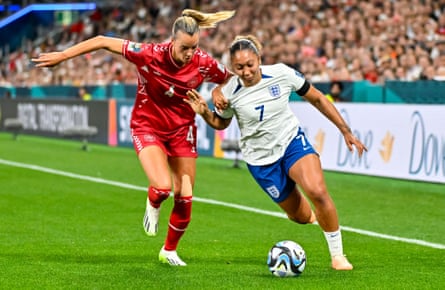 Lauren James tries to find a way past Denmark’s Rikke Sevecke at the World Cup.