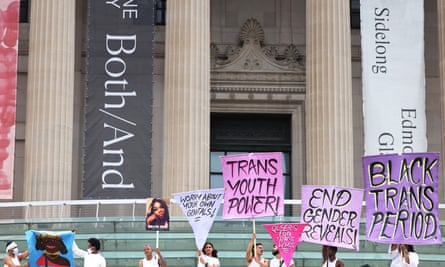 People hold up signs during the Brooklyn Liberation’s Protect Trans Youth event in Brooklyn in 2021.
